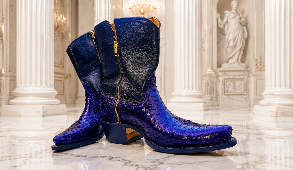 Western GQ luxury fashion — purple snakeskin and navy boots on white marble, classical hall with columns, statue, and chandeliers
